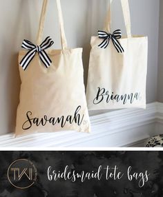 two bridesmaid tote bags with black and white bows on them, one is for