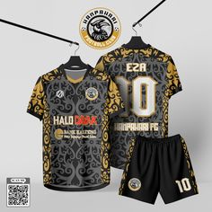 a black and gold soccer uniform with the number 10 on it, next to shorts