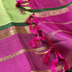 This elegant kanjivaram saree in green woven with muted brown to give a metallic look, is handwoven with korvai borders adorned in deep purple color. The grand pallu mirrors the borders with traditional motifs in gold zari. Approximate Length 6.5 mtrs (inclusive of blouse length)Height - 46 - 52" Saree comes with fall, picot and tassels done when applicable. Blouse piece is cut. Approximate weight - 1.8 lbs Kindly Note : The colors you see on your device may vary due to the color reproduction, b Green Handloom Cotton Silk Saree, Green Cotton Silk Handloom Saree, Festive Green Handloom Saree, Festive Green Handloom Dupatta, Green Slub Silk Dupatta With Zari Weaving, Green Slub Silk Traditional Wear For Puja, Green Handloom Slub Silk Dupatta, Green Cotton Silk Saree With Zari Weaving, Green Handloom Raw Silk Traditional Wear