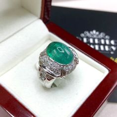 "ENJOY OUR WORRY-FREE SERVICE AND THE DAZZLING, GENUINE JEWELRY WE DESIGN AND HANDCRAFT WITH LOVE❤️ ABOUT THE ITEM: This ring takes PRESTIGE to a whole new level. With VIVID, TOP GRADE, CERTIFIED, TRANSPARENT 7.35 carats, Classy oval cabochon cut, Zambian emerald, with vivid green color extremely similar to that from Colombia. Surrounded by 36 pieces of STUNNING & SPARKLING, natural diamonds. Set in a CUSTOM-DESIGNED, unisex, solidly handcrafted HEAVY 18K solid white gold ring. SUGGESTED RET Luxury Oval Cabochon Emerald Ring, Luxury Cabochon Signet Ring For Formal Occasions, Luxury White Gold Oval Cabochon Emerald Ring, Luxury Hallmarked Emerald Signet Ring, Luxury Oval Cabochon Signet Ring For Anniversary, Luxury Oval Cabochon White Gold Rings, Luxury White Gold Oval Cabochon Rings, Formal White Gold Emerald Signet Ring, Formal White Gold Emerald Ring With Oval Cabochon