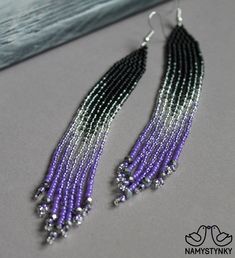 purple and black beaded earrings with silver beads