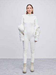 White Long Sleeve High Stretch Jumpsuits And Rompers, Flexible White Long Sleeve Jumpsuits And Rompers, White High Stretch Long Sleeve Jumpsuits And Rompers, White Long Sleeve Jumpsuits For Winter, White Long Sleeve Winter Jumpsuits And Rompers, Winter Turtleneck Ribbed Bodysuit, White Fitted Winter Jumpsuit, Winter Ribbed Turtleneck Bodysuit, White Fitted Jumpsuits And Rompers For Winter