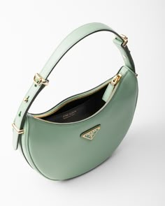 Aquamarine Prada Arqué Leather Shoulder Bag | PRADA Prada Arque Bag, Ysl Green Bag, Green Designer Bag, Luxury Shoulder Bags, The Row Bag, Simple Bag, Prada Purses, Prada Fashion, Luxury Bags Collection