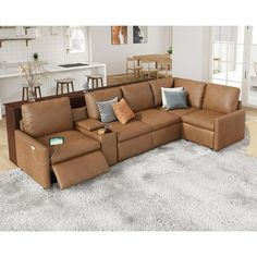 a living room with a large sectional couch