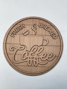 a wooden sign that says fresh brew coffee