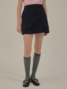 Charles de Rohan is constantly researching to express his own unique style in everyday life by combining France's unique classicism and unique loveliness.- This is a cargo miniskirt with a kitschy charm in a casual atmosphere- Out pockets on both sides add a point- The slightly A-line silhouette creates a slim leg line- Great for matching with any items Mini Cargo Skirt For Workwear, Navy Fitted Skort For Workwear, Fitted Navy Skort For Work, Mini Cargo Skirt With Pockets For Work, Fitted Cargo Pocket Skort For Workwear, Fitted Cargo Skort For Workwear, Navy Fitted Skort With Pockets, Fitted Navy Skort With Pockets, Navy Workwear Skirt With Pockets