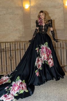 Calling all moody brides with a flair for the dramatic! We found dark princess rings and bold bridal looks - think flowing gothic gowns, jewel-toned velvet dresses, and even a black leather reception dress like Selena’s! See the rings we’d pair with these dresses #weddingdress #blackweddingdress #bridestyle