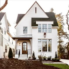 a large white house with two story windows