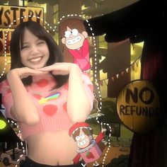 a woman standing in front of a sign with cartoon characters on it's chest