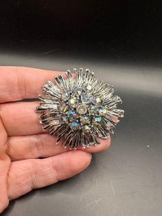 Cute pin!  Great gift!  In good vintage condition!  Minor wear on finish. Vintage Rhinestone Pins For Party, Vintage Star-shaped Jewelry For Party, Vintage Star-shaped Party Jewelry, Vintage Rhinestone Party Pins, Silver Rhinestone Brooches For Vintage Events, Vintage Brooches With Sparkling Stones For Gift, Mirror Ornament, Vintage Gold Brooches With Rhinestones, Silver Retro Brooch Pin