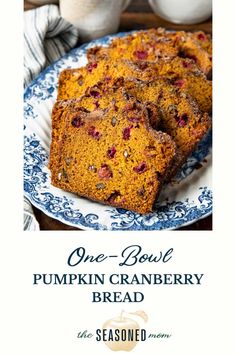 one bowl pumpkin cranberry bread on a blue and white plate