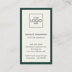 a white marble business card with a green border and logo on the front, along with a dark green trim