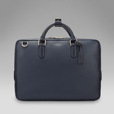 Classic Business Luggage With Leather Lining, Designer Rectangular Business Luggage, Designer Business Luggage In Rectangular Shape, Designer Business Luggage, Elegant Leather Luggage With Zipper Closure, Elegant Leather Luggage, Luxury Travel Cases With Zipper Closure, Designer Rectangular Briefcase With Zipper Closure, Luxury Travel Briefcase With Zipper Closure