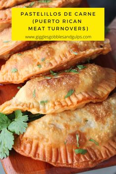 several pastries on a wooden platter with cilantro garnishes