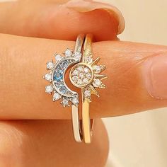 ✨ Embrace the celestial allure with our Celestial Sun Moon Ring Set! 🌞🌙 Let the enchanting quote "Live by the sun, love by the moon" guide your journey. Crafted with love, this set is made of 925 Sterling Silver, adorned with sparkling crystals, and plated with White Gold. 💖 ✨ Rest assured, this ring is Nickel-free, Lead-free, Cadmium-free, and Hypoallergenic, ensuring a safe and comfortable wearing experience for all. 💫 Quality Assurance guarantees its skin-friendly nature, making it a perf Celestial Moon Phase Crystal Ring, Adjustable Magical Jewelry With Sun And Moon Design, Adjustable Magical Sun And Moon Jewelry, Adjustable Celestial Jewelry With Sun Design, Adjustable Celestial Crystal Ring With Moon Phase, Adjustable Celestial Sun Design Jewelry, Adjustable Ring With Sun And Moon Design, Magical Sun And Moon Design Ring As Gift, Adjustable Sun And Moon Design Rings