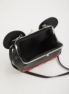 An adorable Mickey Mouse bag fits the essentials and lets you add playful personality to your everyday look. Kiss lock closure. Removable strap. 9. 5”W x 7. 25” H x 3. 5”D. 59. 5” strap length. Man-made material. Imported. The best plus size women's disney mickey mouse kiss lock crossbody handbags in multi. Torrid is your destination for cozy fall and winter clothes to keep you warm and comfortable. Torrid is your destination for plus size Mickey Mouse merchandise. Cute Black Shoulder Bag With Detachable Strap, Handheld School Satchel With Adjustable Handle, Cute Leather Bag With Adjustable Strap, Cute Adjustable Bags For Travel, Cute Adjustable Travel Bags, Black Novelty Bag For Everyday Use, Cute Black Leather Bag, Adjustable Crossbody Shoulder Bag For School, Novelty Portable Travel Bag