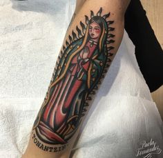 a person with a tattoo on their arm