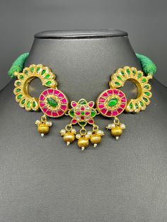 Jadau kundan /choker with earrings in brass to make your occasion dazzle!   Handcrafted  Ethnic Kundan Necklace and matching Earrings Set. * It's made from Brass n Copper Pink, green and White Multi color Kundan Stones Settings with 22 ct gold Plating on Jadau motifs.  Occasion to wear: Party, wedding, marriage, kitty parties and any special occasion. *Handcrafted with care by happy hands and full hearts by world class artisans across India. Traditional Kundan Choker Necklace For Ceremonial Occasions, Traditional Kundan Bridal Necklace Adjustable, Ceremonial Traditional Kundan Choker Necklace, Traditional Kundan Bridal Necklace With Adjustable Fit, Bollywood Style Beaded Jewelry For Rituals, Bridal Temple Jewelry Cutdana Choker, Handmade Kundan Necklace For Ceremonial Occasions, Traditional Hand-set Kundan Choker Necklace, Traditional Hand Set Kundan Choker Necklace