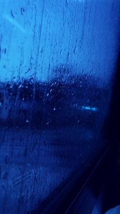 rain drops on the window of a train