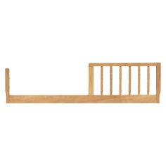 a wooden bed frame with bars on the sides