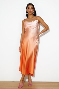 Length from shoulder to hem of size S: 110cm. Midi dress. Unlined. Model is a standard XS and is wearing size XS. True to size. Cowl neck. Open criss-cross back. Flowy, non-stretch material. Zipper. Cold hand wash only. Polyester. Freshen up your looks girl in the Luxe Ombre Midi Dress. Featuring a cowl neck and an open criss-cross back. Style with heels and curls. Elegant Orange Slip Dress For Spring, Spring Evening Orange Slip Dress, Fitted Orange Slip Dress, Fitted Orange Slip Dress For Spring, Casual Satin Midi Dress For Brunch, Orange Slip Dress For Spring Party, Homecoming Romper, Dress Date Night, Ombre Dress