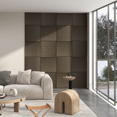 a living room filled with furniture next to a large glass wall covered in wood panels