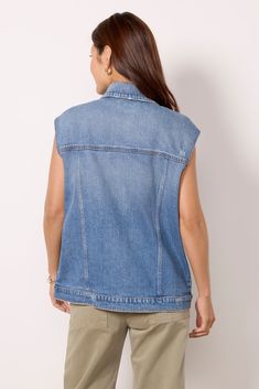 Layer your look with the Luka denim vest by EVEREVE. This longline silhouette is crafted in medium-wash denim with a front button closure, collared neckline, and oversized pockets. Pair with a fitted midi dress or a tank and cargo pants. | EVEREVE Women's Luka Vest, Size Medium, Blue Casual Medium Wash Denim Vest, Sleeveless Medium Wash Denim Top For Fall, Spring Denim Vest In Medium Wash, Light Wash Sleeveless Denim Jacket, Sleeveless Light Wash Denim Jacket, Fall Medium Wash Denim Vest, Medium Wash Denim Vest With Pockets, Spring Denim Button-up Vest, Button-up Medium Wash Vest For Spring