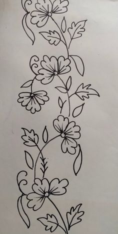 a drawing of some flowers on a piece of paper with lines drawn across it and in the middle