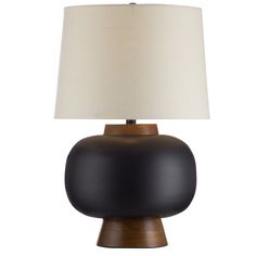 a black lamp with a white shade on it