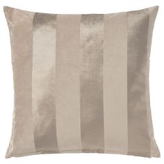 a beige and silver striped pillow on a white background