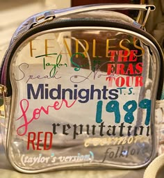 a clear handbag with writing on it