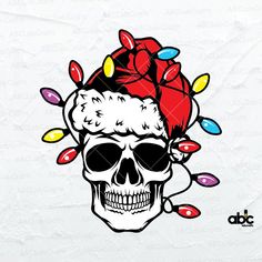 a skull wearing a santa hat with christmas lights