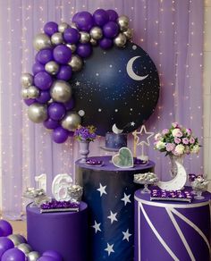 purple and silver party decorations with balloons