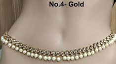 * Beautifully designed gold color belly chain. * can be used with belly dance costumes and saris. Adjustable from  to 24 to 38 inches waist. Party Kundan Necklace With Gold Beads, Gold Kundan Necklace For Festival, Elegant Waist Chain For Parties And Festivals, Gold Kundan Necklace For Party, Bollywood Style Waist Chain With Tilla For Festive Occasions, Traditional Waist Chain For Festivals And Parties, Gold Tikka For Party And Festivals, Gold Kundan Necklace With Gold Beads Bollywood Style, Gold Bollywood Kundan Necklace For Party