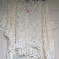 Nwt Will Fit A S To L 33" Long Flowing Poncho Look But Built In 1/2 Sleeves Very Light Creamy White Cream Lace Top With Crochet Details, Cream Lace Tops With Crochet Trim, White Crochet Top With Lace Work, Cream Lace Blouse With Crochet Trim, Casual White Crochet Top With Lace Patchwork, Short Sleeve Lace Crochet Top With Crochet Trim, White Lace Tops With Crochet Trim, White Lace Crochet Top With Short Sleeves, Creamy White