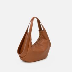 The Arcadia Masai takes inspiration from an ethnic flavour. Her silhouette is marked by curvy and original lines, always up to date. Italian Leather Handbags, Latest Colour, Large Tote, Up To Date, Leather Working, Italian Leather, Real Leather, Calf Leather, Buy Now