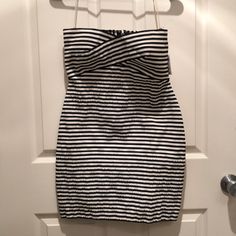 Black & White Striped Dress. Cut Out Back. Brand New, Never Been Worn. Elegant Black And White Mini Dress For Summer, Black And White Mini Dress For Night Out, Striped Summer Evening Dresses, Striped Evening Dresses For Summer, Chic Black And White Bodycon Dress, Black And White Evening Mini Dress For Summer, Chic Fitted Black And White Mini Dress, Sleeveless Black And White Mini Dress For Night Out, Fitted Strapless Striped Dress