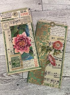 two tags with flowers and music notes on them