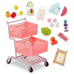 a toy shopping cart filled with lots of different foods and items to make it look like a doll