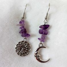 Gothic Sun Crescent Moon Purple Silver Tone Earrings Silver Moon Earrings For Festivals, Silver Spiritual Moon Phase Earrings, Silver Dangle Crystal Earrings For Festivals, Silver Moon Phase Earrings, Silver Symbolic Moon Phase Earrings, Symbolic Silver Moon Phase Earrings, Bohemian Silver Crystal Earrings With Moon Charm, Silver Bohemian Crystal Earrings With Moon Charm, Purple Earrings Aesthetic