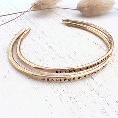 "This rustic brass bangle is made from 10 gauge solid brass wire. Hand Forged into a bangle, then personalized with your words. The brass bangle has an organic look to it. H A N D-S T A M P I N G-P R O C E S S *All personalization is done by hand Hand stamping is a process where each letter is individually stamped into the metal. Each letter may not line up perfectly and some letters may be deeper than the others. Although I do try my best to make sure each letter is as straight as possible. Thi Adjustable Brass Bangle Gift, Adjustable Brass Bangle As Gift, Adjustable Brass Bracelets For Anniversary, Inspirational Gold Name Bracelet For Personalized Gift, Gold Engraved Cuff Bracelet For Friendship, Inspirational Gold Bracelet Hand Stamped, Inspirational Gold Bracelet, Hand Stamped, Inspirational Personalized Gold Bracelets, Inspirational Hand Stamped Gold Bracelet