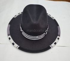 This listing is for beaded edge and brim fedora hat. The beads go around the whole edge and brim. The brim band is removable and can therefore be used on another hat. Most hat brims are one size fits all.I have made a beautiful pattern that goes all round. Instead of having a plain fedora hat, this one is more beautiful with beads. Band height is 1 inch Circumference 57cm   I ship via DHL express. Native Hats, Diy Hat Stand, Beaded Cowboy Hat, African Hair Accessories, Beaded Caps, Beaded Hats, Beaded Ideas, Beaded Hat Bands, Beaded Stuff