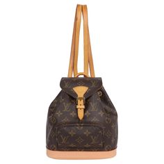 Authentic, pre-loved Louis Vuitton monogram Montsouris backpack Pm. Features monogram canvas with leather trim, front zippered pouch, top string closure with buckle front flap, the interior has a brown textile lining with d ring, adjustable shoulder straps. This bag is perfect for shopping, travel, school, and hands-free needs. Date code: See photos SP0976 Made in France 1996 8.25"L x 3.8"W x 9"H Condition Gently Used Exterior scuff marks, marks and stain marks on the leather parts and straps, n Louis Vuitton Montsouris Bb, Mochila Louis Vuitton, Backpack Louis Vuitton, Designer Brown Leather Backpack, Luxury Level, Montsouris Backpack, Louis Vuitton Montsouris Backpack, Louis Vuitton Brown, Zippered Pouch, Travel School