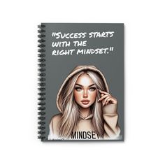 a spiral notebook with the words success starts with the right minds on it, and an image of a woman's face