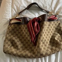 This Purse Has Been In My Closet For Over 15 Years. It Was My First Designer Purchase In Las Vegas Inside The Gucci Boutique . The Scarf Has A Few Marks , I Have Not Tried To Clean. One Spot On The Bag Has A Mark. The Purse Is In Great Condition. Please See Photos For Close Ups And Wear On The Leather.Inside Is Immaculate. No Rips Or Tears .Classic Gg Throughout. Gucci Hobo Bag Vintage, Gucci Boutique, Gucci Hobo Bag, Gucci Vintage Bag, Wicker Purse, Gucci Purse, O Bag, Gucci Vintage, Gucci Monogram