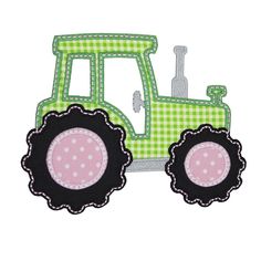 a green and white tractor applique on a white background