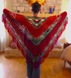 Beautiful unique shawl made with synthetic yarn.   56" x 36" of soft cozy comfort.  Handmade in the USA from salvaged yarn. Red Shawl Wrap, Bohemian Yarn Shawl For Winter, Bohemian Winter Yarn Shawl, Bohemian Winter Shawl Made Of Yarn, Bohemian Hand Knitted Shawl Wrap, Bohemian Hand-knitted Shawl Wrap, Handmade Yarn Shawl For Winter, Bohemian Hand-knitted Yarn Shawl, Handmade Yarn Shawl Scarf