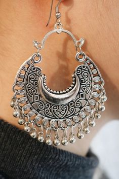 These rustic oxidised look earrings are perfect for antique and ethnic style jewellery lovers, handmade with German silver by artisans in the Indian Subcontinent. The work is intricately crafted to give the most stunning finish featuring a sunflower shape  and an embossed detailed bell jumkhay with complimenting silver bead embellishments. They are very lightweight and easy to wear. Each of our pieces are carefully handcrafted by talented artisans. Slight imperfections and differences in size an Funky Necklace, German Silver, Ethnic Fashion, Jewelry Lover, Antique Style, Silver Beads, Beautiful Necklaces, Hippie Boho, Jewelry Pieces