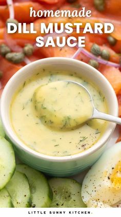 homemade dill mustard sauce in a bowl with sliced carrots and cucumbers