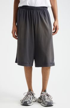 Balenciaga brings its bent for the bold to your casual wardrobe with these dramatically baggy cotton shorts distressed and faded to old-favorite perfection. 13 1/2" inseam; 31 1/2" leg opening; 15 1/2" front rise; 18" back rise (size Medium) Elastic waist 100% cotton Machine wash, dry flat Made in Portugal Designer Clothing Relaxed Fit Faded Short Bottoms, Sporty Relaxed Fit Bermuda Shorts For Streetwear, Faded Washed Short Bottoms, Casual Faded Distressed Shorts, Relaxed Fit Distressed Gray Bottoms, Washed Shorts For Streetwear In Short Length, Faded Distressed Casual Shorts, Casual Faded Shorts For Streetwear, Distressed Gray Relaxed Fit Bottoms